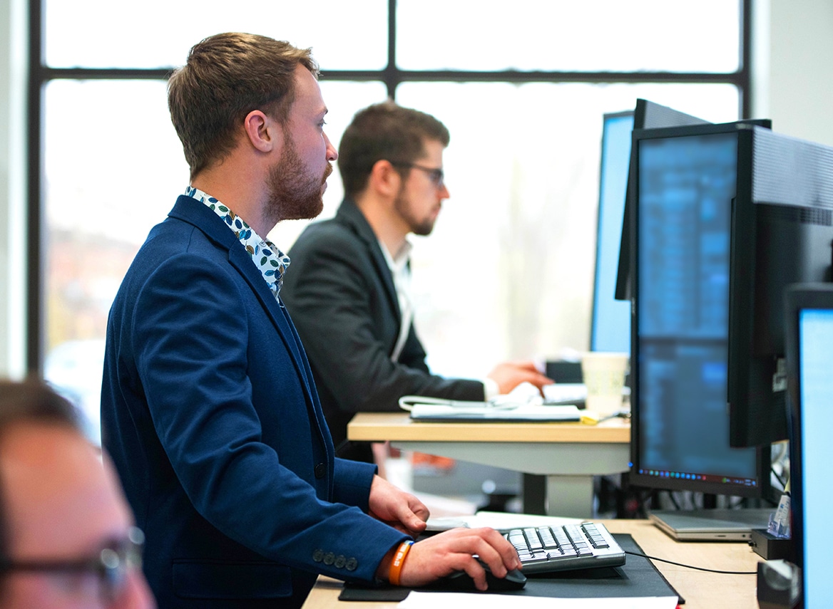 man working on public computer